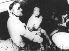 Mężczyzna z dzieckiem.